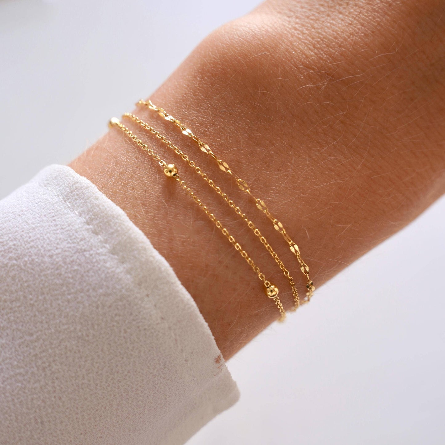 Bracelet à triple chaine